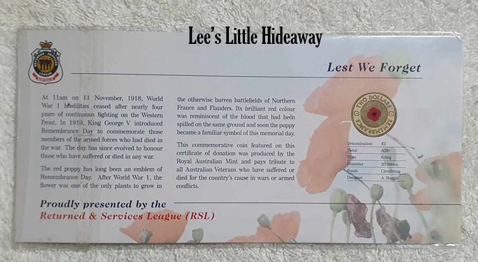 2012 $2 red poppy commemorative UNCIRCULATED - RSL card with plastic cover