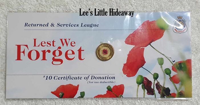 2012 $2 red poppy commemorative UNCIRCULATED - RSL card with plastic cover